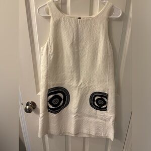 Elegant White Sleeveless Dress with Black Accents